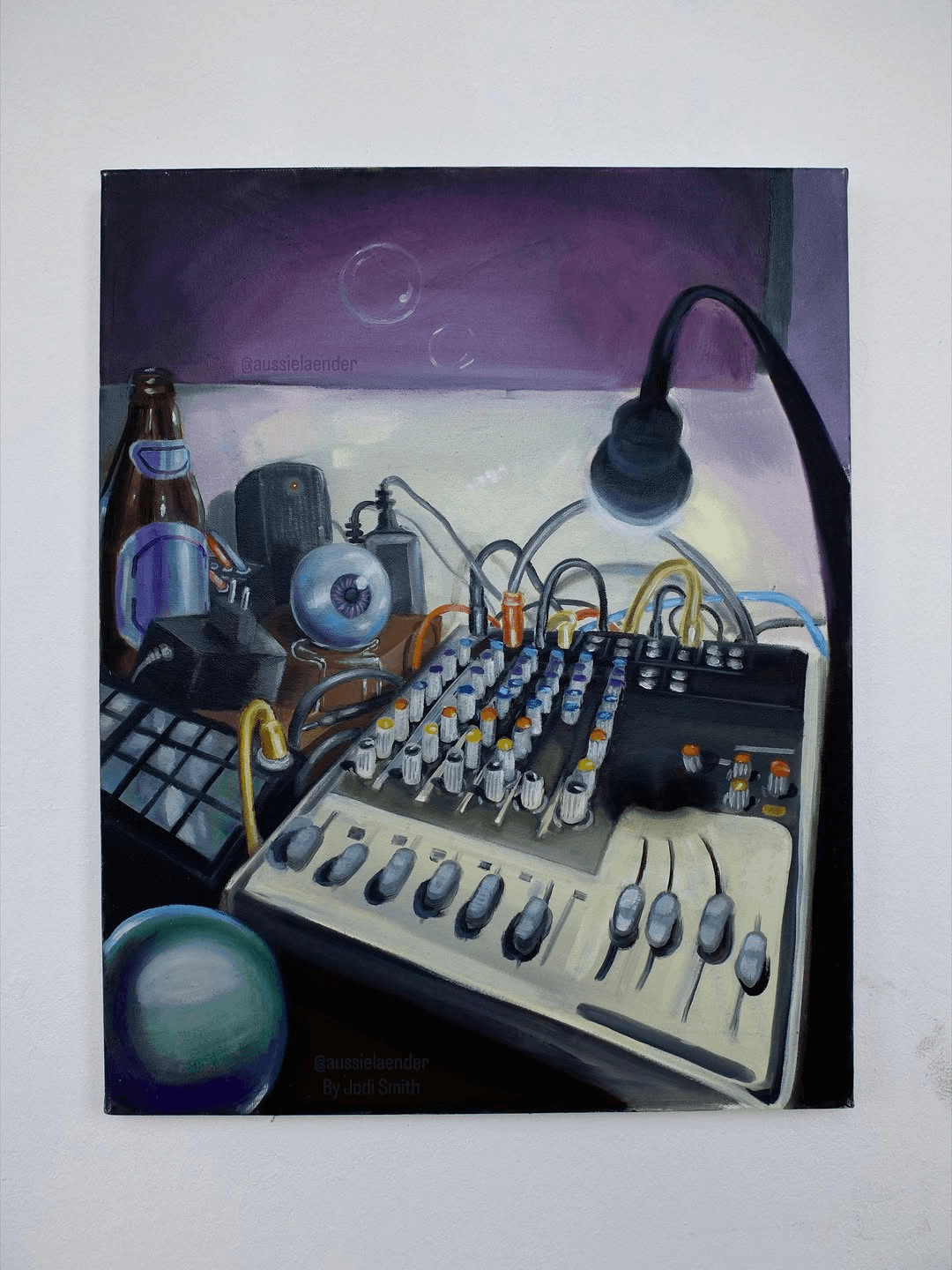 Still life with mixing desk, eyeball and glass sphere in violet tones